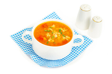 Thick homemade vegetable soup with rice, pumpkin and tomatoes