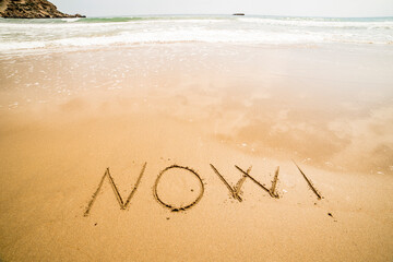 Words written on the sand on the beach