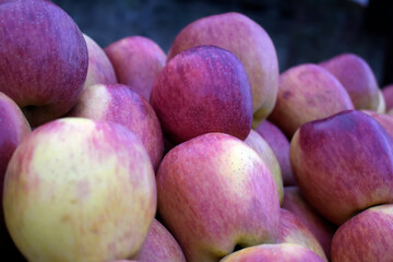 Closeup shot of a pile of fresh apples in a market place, Apples at Market in a Bunch