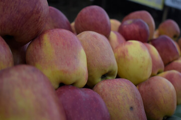 Closeup shot of a pile of fresh apples in a market place, Apples at Market in a Bunch