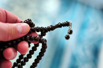 Prayer rug and rosary for worshiping in the month of Ramadan,