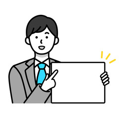 白紙のメッセージボードを持つ男性会社員