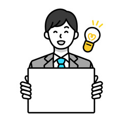 白紙のメッセージボードを持つ男性会社員