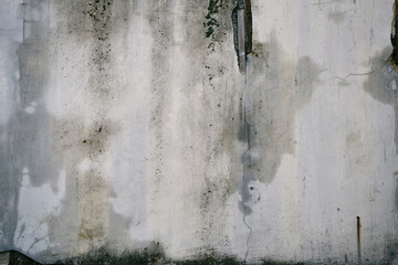 dirty wet texture of old plastered wall