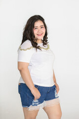 Portrait half body shot of Asian young happy cute friendly overweight fat teen long black hair...