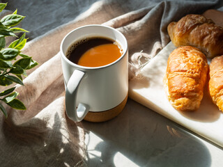 cup of coffee and croissant