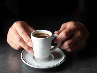 cup of coffee in hand