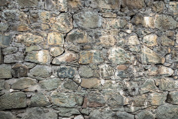 Backgrounds of the old fortress wall. Background of vintage stone wall