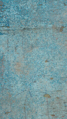 Fototapeta na wymiar Vertical old blue-painted chipboard texture or background for mobile devices