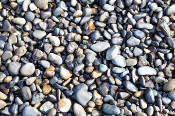 Smooth rocks on the Miho beach background.