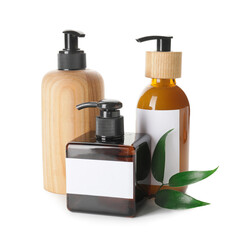 Bottles with natural shampoo on white background