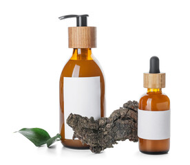 Bottles with natural shampoo on white background