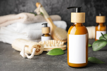 Bottles with natural shampoo on dark background