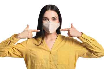 Stylish young woman wearing mask on white background