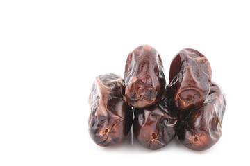 Date palm fruits on white background.