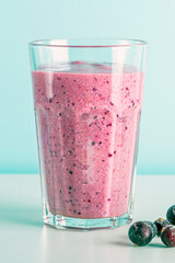 Homemade blueberry or currant smoothie with cottage cheese and fruits. Concept of proper nutrition and healthy eating. Organic and vegetarian drink