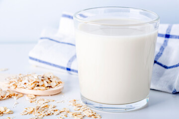Home Cooking oat vegetable milk in glass. Homemade food concept. Plant based organic veggie milk, lactose free