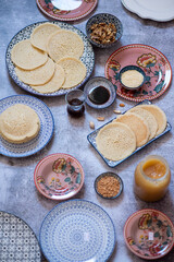 Fototapeta na wymiar Atayef Qatayef, katayef is an Arab dessert commonly served during the month of Ramadan. Middle Eastern pancakes. High quality photo