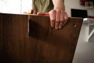 person cutting board at home