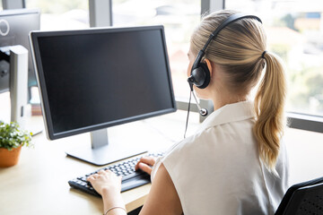 Call center woman advising customers calling.