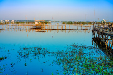 Small Wooden Bridge with Soft Water in Kwan Phayao Lake