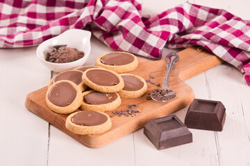 Shortcrust pastry biscuits with chocolate. 