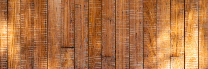 wood texture under sunlight. Texture can be used for the background of the text or any content. Banner