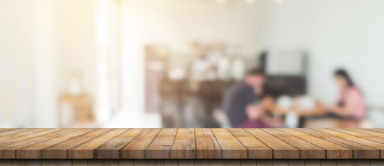 Empty wood table and blurred light table in coffee shop and cafe with bokeh background. product display template.