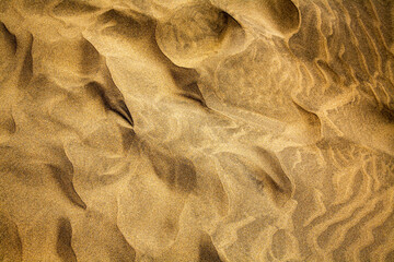Formen im Sand