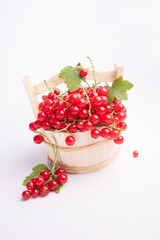 red currants in a wooden basket