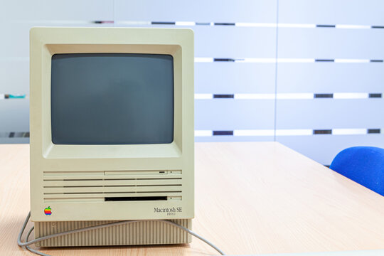 Bilbao, Spain - 04-17-2021 - Apple workstation, antigue model of macintosh ins a office background enviroment