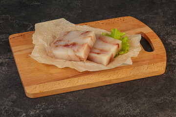 Raw pollock fish fillet for cooking