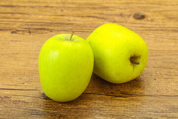 Two ripe green sweet apples