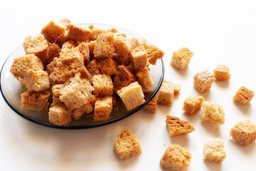 homemade rusks croutons of white crispy bread close up crackers on the plate