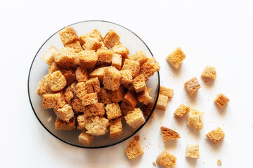 homemade rusks croutons of white crispy bread close up crackers on the plate