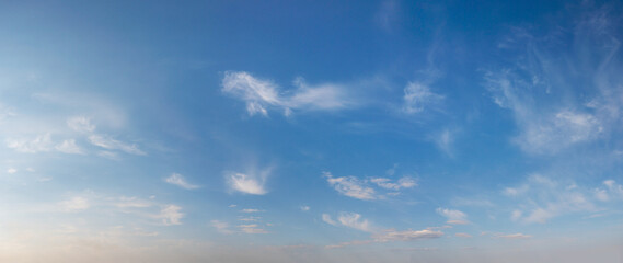 wide panorama of the sky with feather clouds at daytime