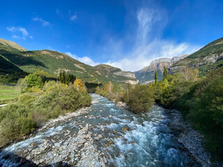 the Ara river as it passes through the town of Torla, in the Aragonese Pyrenees, located in Huesca, Spain
