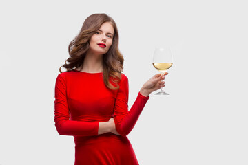 Beautiful woman holding glass of wine onwhite background