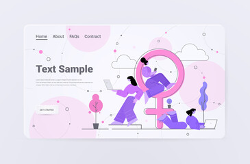 women using digital gadgets near female gender sign feminism girl power equal social and civil rights equality