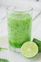 Healthy eating. Celery, spinach and lime smoothie.
