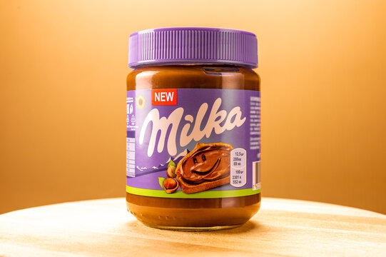 Moscow, USA - APRIL 18, 2021. jar of milka chocolate paste with hazelnuts on a beautiful background. Milka is a chocolate brand owned by Mondelez International.