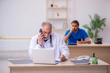 Two doctors working in the clinic