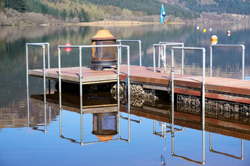 Pier on lake with BBQ at Loch Eck in Dunoon