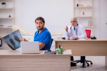 Two doctors working in the clinic