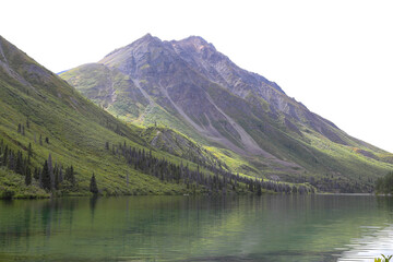 view on green mountain and lake. hiking trail called st elias lake trail, Yukon, Canada
