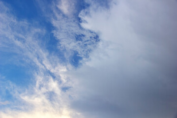 Obraz premium Beautiful cloudy sky bright blue sky with white clouds on a Sunny summer day