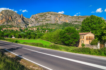 Picturesque Moustiers Sainte Marie village and high cliffs, Provence, France