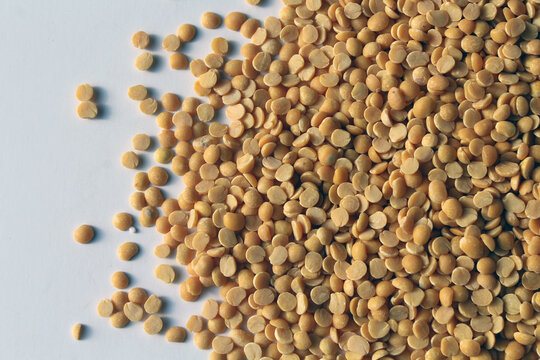 Toor dal, famous Indian legume also called yellow Pigeon peas. Selective focus.