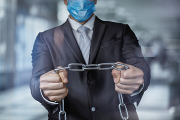 Concept of shackles in business during an epidemic and pandemic.