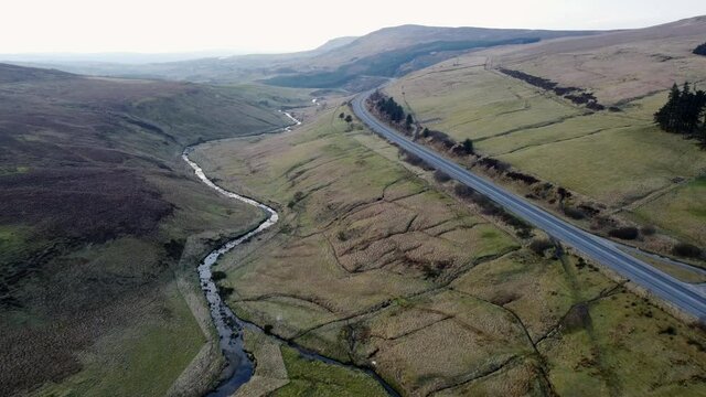 Aerial video of the Glenshane pass and road over the Sperrin Mountains in Northern Ireland